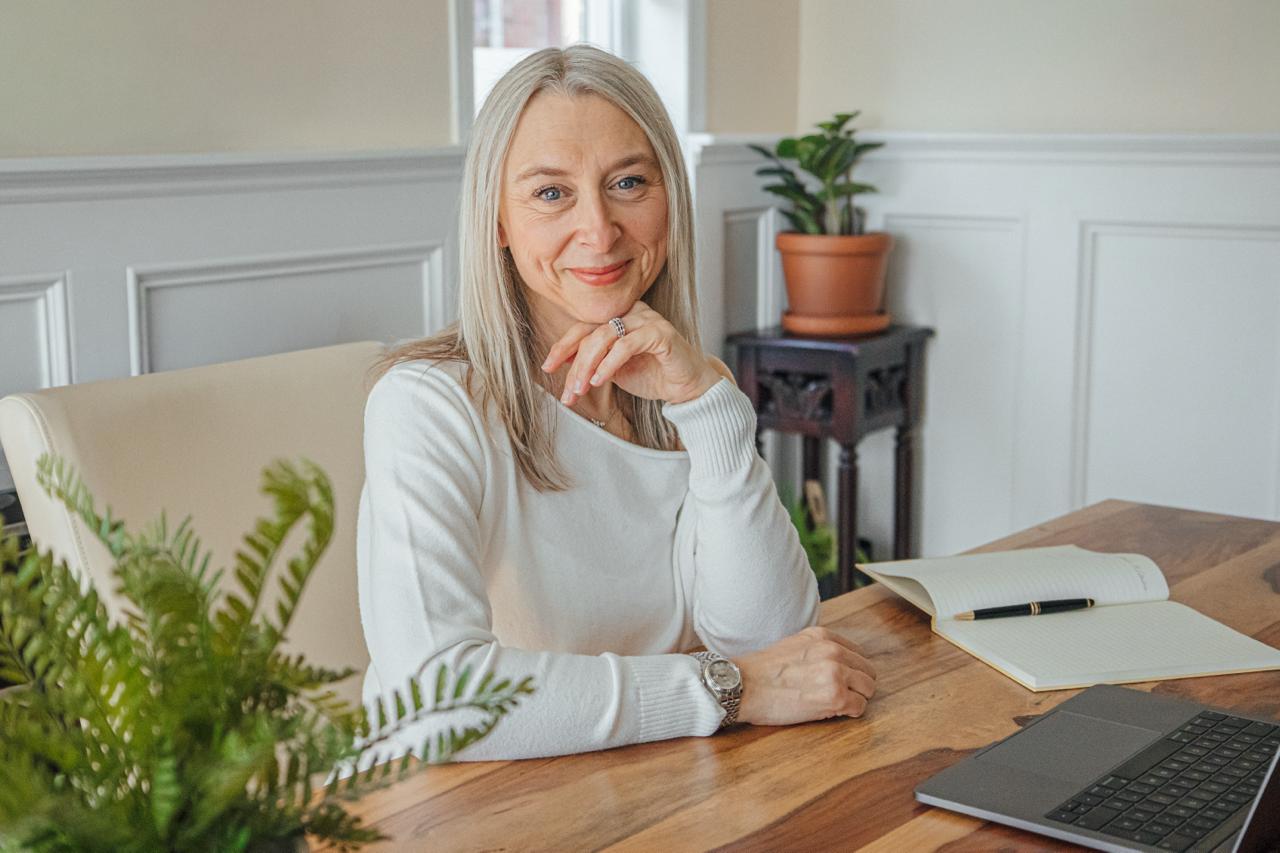 Luba at her desk — where the work begins